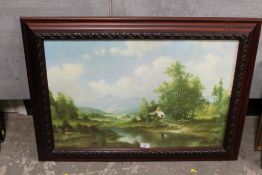 A LARGE FRAMED AND GLAZED OIL ON BOARD OF A RIVERSIDE COTTAGE SCENE