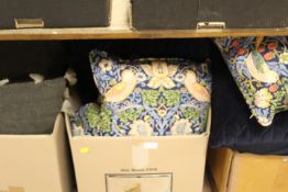 THREE BOXES OF ASSORTED TEXTILES COMPRISING CUSHIONS ETC AND A THROW