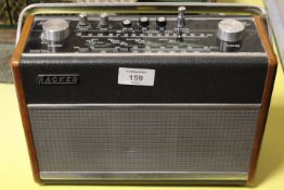 A HACKER RADIO LIMITED HUNTER PORTABLE RADIO