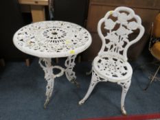 A WHITE PAINTED CAST PATIO TABLE & CHAIR