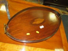 AN ANTIQUE MAHOGANY TWIN-HANDLED SERVING TRAY WITH INLAID DETAIL
