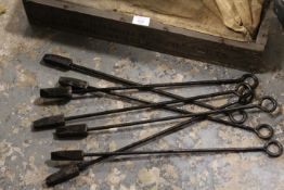 A CASE OF CAST METAL BRANDING IRONS IN ORIGINAL BOX