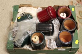 A SMALL TRAY OF LEATHER BOUND DICE SHAKERS AND DICE .ETC.