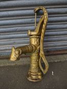 A CAST GILT METAL WATER PUMP
