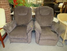A PAIR OF MODERN UPHOLSTERED ELECTRIC ARMCHAIRS