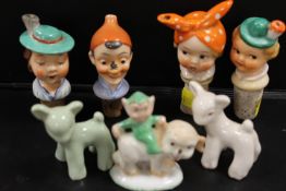 A SELECTION OF GOEBEL PORCELAIN HEADED BOTTLE STOPPERS TOGETHER WITH THREE MABEL LUCIE ATTWELL STYLE