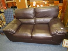 A MODERN BROWN TWO SEATER SETTEE