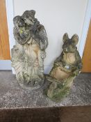 A GARDEN FIGURE DEPICTING A COUPLE EMBRACING TOGETHER WITH ANOTHER GARDEN FIGURE OF A GENTLEMAN