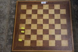 A VINTAGE WOODEN CHESS BOARD