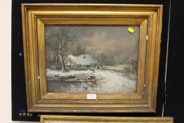 A GILT FRAMED AND GLAZED OIL PAINTING OF A WINTER COTTAGE SCENE SIGNED LOWER LEFT AND DATED 1896