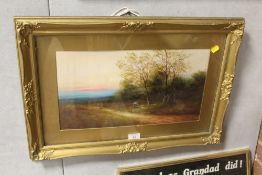 AN ANTIQUE GILT FRAMED AND GLAZED OIL ON BOARD OF FIGURES GATHERING WOOD