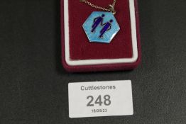 A DAVID ANDERSON SILVER AND ENAMEL PENDANT ON CHAIN