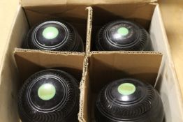 A BOXED SET OF THOMAS TAYLORS LIGNOI SCOTCH BOWLS