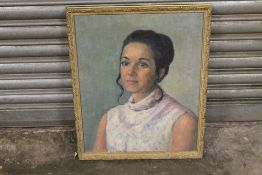 A GILT FRAMED PORTRAIT OF A LADY SIGNED LOWER RIGHT KATHLEEN TOWNSEND 1971
