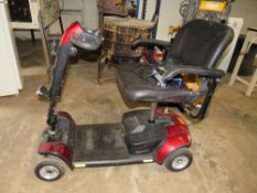 A GO GO ELITE TRAVELLER MOBILITY SCOOTER WITH CHARGER