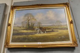 A GILT FRAMED AND GLAZED OIL ON CANVAS OF A FARMER PLOUGHING A FIELD WITH TWO SHIRE HORSES SIGNED