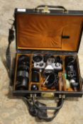 A CASED PRAKTICA CAMERA WITH ACCESSORIES