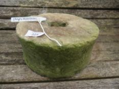 A SMALL ANTIQUE SANDSTONE WHEEL, DIA. 22 cm