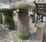AN ANTIQUE SANDSTONE STADDLESTONE, H 65 cm
