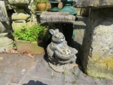 A MODERN GARDEN RABBIT BIRDBATH