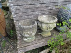 TWO SMALL STONE GARDEN URNS