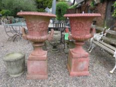 A LARGE AND IMPRESSIVE PAIR OF TERRACOTTA CAMPANA URNS ON PLINTHS, H 117 cm (2)