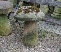 AN ANTIQUE SANDSTONE STADDLESTONE, H 64 cm