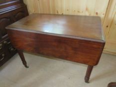 A VICTORIAN MAHOGANY PEMBROKE TABLE RAISED ON REEDED TURNED SUPPORTS