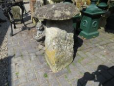 AN ANTIQUE SANDSTONE STADDLESTONE, H 73 cm