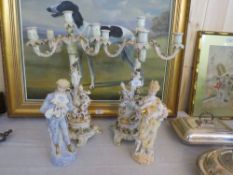 A LARGE PAIR OF CONTINENTAL PORCELAIN FIGURATIVE FIVE BRANCH CANDELABRA - H 49 cm, TOGETHER WITH A