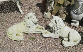 A PAIR OF RE-CONSTITUTED GARDEN LIONS, L 64 cm (2)