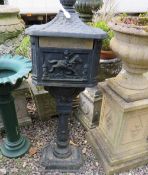 A REPRODUCTION CAST POST BOX ON STAND, H 116 cm