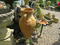 A TERRACOTTA STYLE TWIN HANDLED VASE ON STAND, H 93 cm