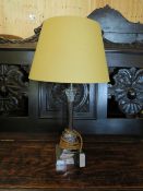 A SILVER PLATED CORINTHIAN COLUMN TABLE LAMP AND SHADE