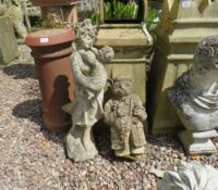 A FIGURATIVE GARDEN STATUE AND A FOX ORNAMENT (2)