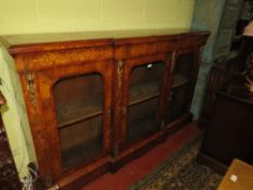 A VICTORIAN WALNUT AND INLAID GLAZED BREAKFRONT BOOKCASE, W 180 cm