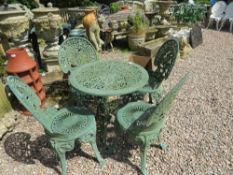 A GREEN PAINTED CIRCULAR GARDEN TABLE AND FOUR CHAIRS
