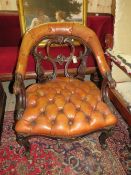 A QUALITY VICTORIAN CARVED OAK LEATHER UPHOLSTERED CLUB CHAIR