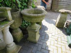 A GARDEN URN AND A PLANTER (2)