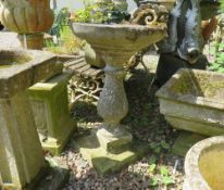 AN ANTIQUE STONE GARDEN BIRDBATH, H 70 cm