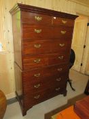 A GEORGE III MAHOGANY TALLBOY WITH TWO SHORT ABOVE A RANGE OF SIX LONGER DRAWERS, RAISED ON