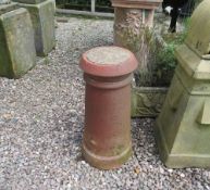 A TERRACOTTA CHIMNEY POT