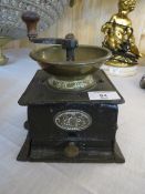 A VINTAGE 'J & W FINDLAY - LIVERPOOL' COFFEE GRINDER AND A CAST SMOOTHING IRON (2)