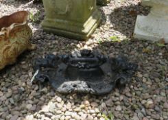 A VINTAGE CAST IRON BOOT SCRAPER