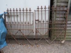 A HEAVY PAIR OF CAST IRON GATES WITH SPEAR AND SPIKE DETAIL, L 243 cm, H 161 cm A/F