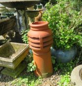 A TERRACOTTA CHIMNEY POT, H 84 cm