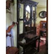 A VICTORIAN CARVED OAK HALL STAND