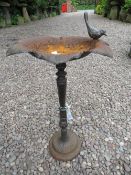 A MODERN CAST LEAF BIRD BATH