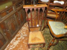 A VINTAGE OAK WICKER SEAT PRAYER CHAIR