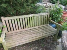 A HARDWOOD GARDEN BENCH
